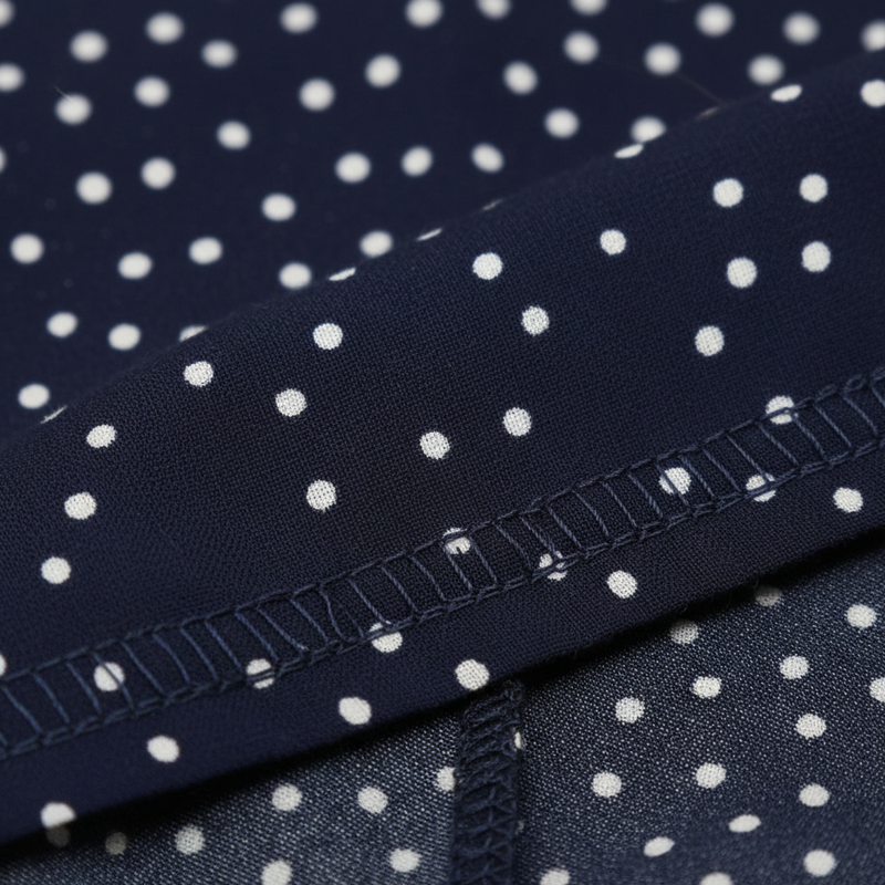 Celeste Polka Dot Strappy Sundress — detalle del tejido